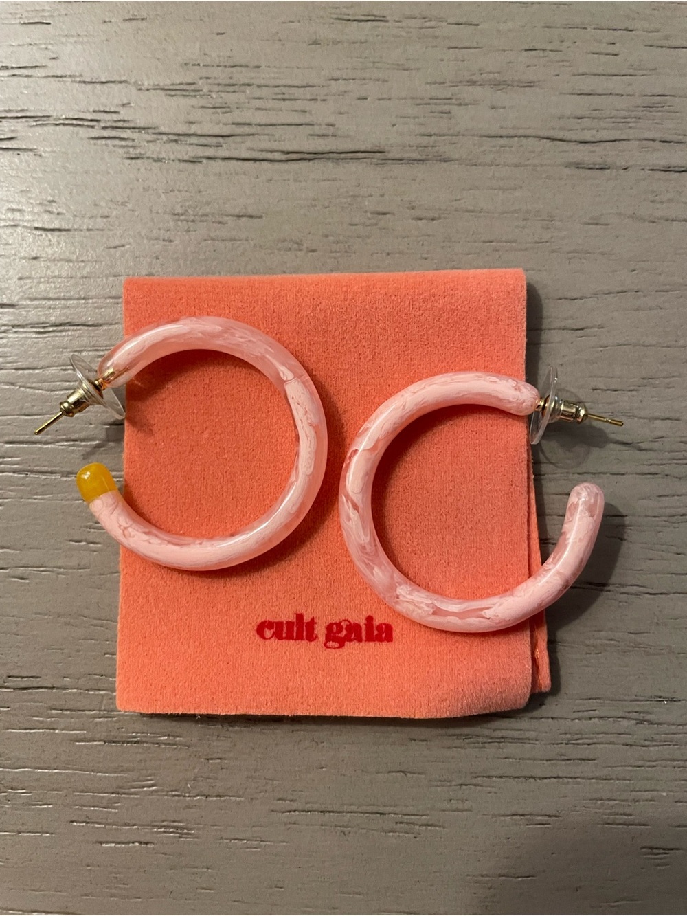 cult gaia pale pink marbled hoop earrings with gold posts